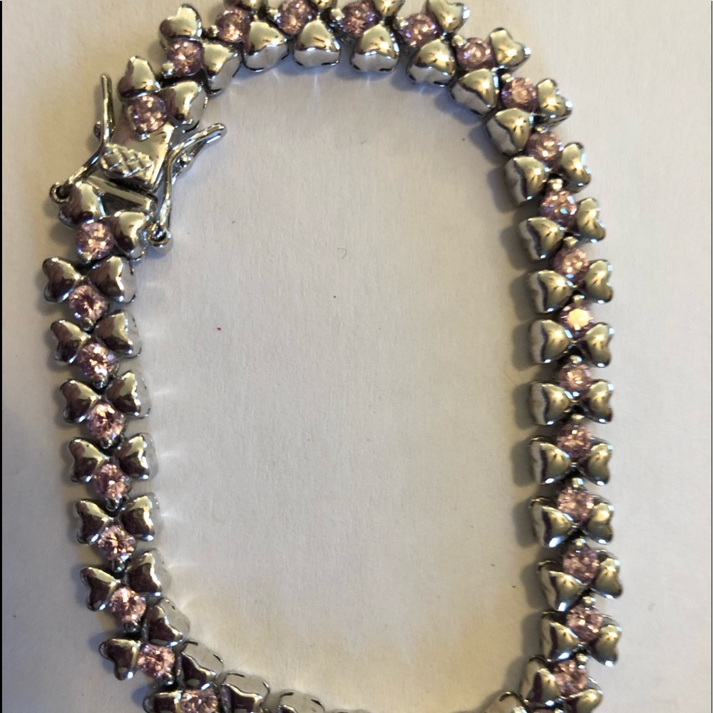Sterling silver and pink stone bracelet.